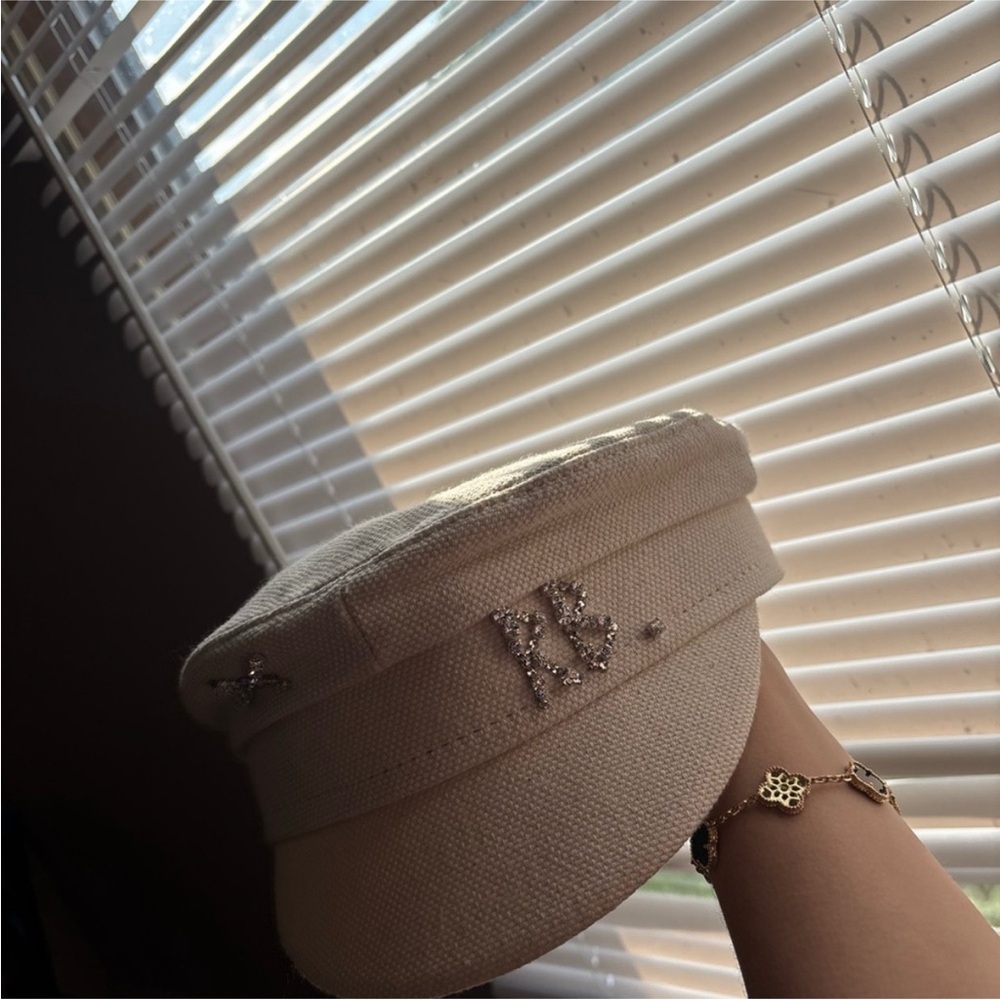 Elegant Cream Cap with Rhinestone Detailing